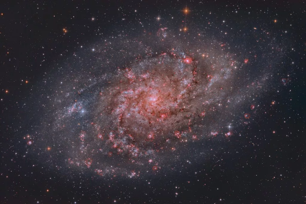 تصویر روز ناسا ابرهای هیدروژنی M33.webp